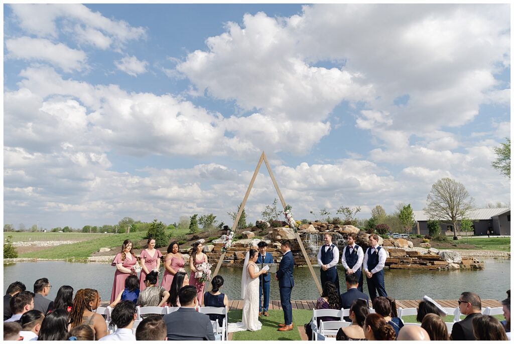 wedding ceremony at retreat 21 near waterfall