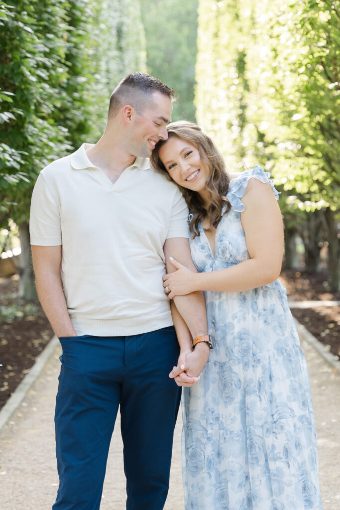 franklin-park-conservatory-engagement-photo-by-trees