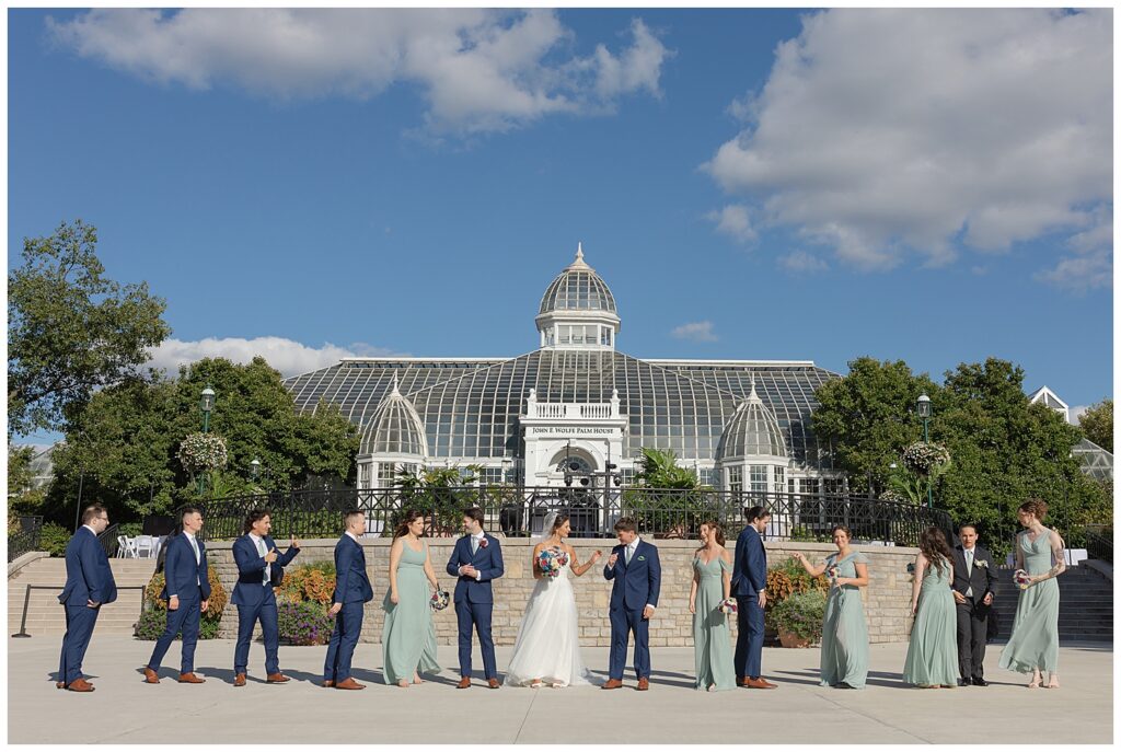 bridal party lined up in the gardens at the Franklin Park Conservatory