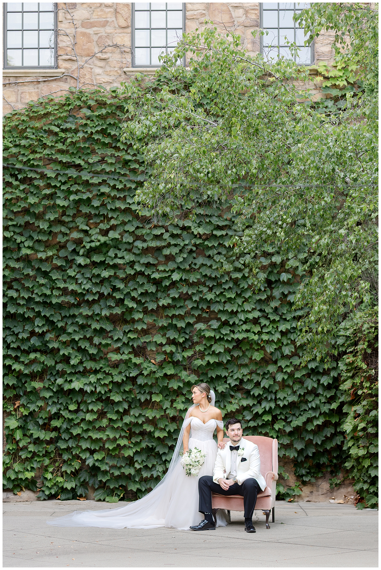 Club at Corazon Dublin Ohio Italian wedding couple next to ivy wall