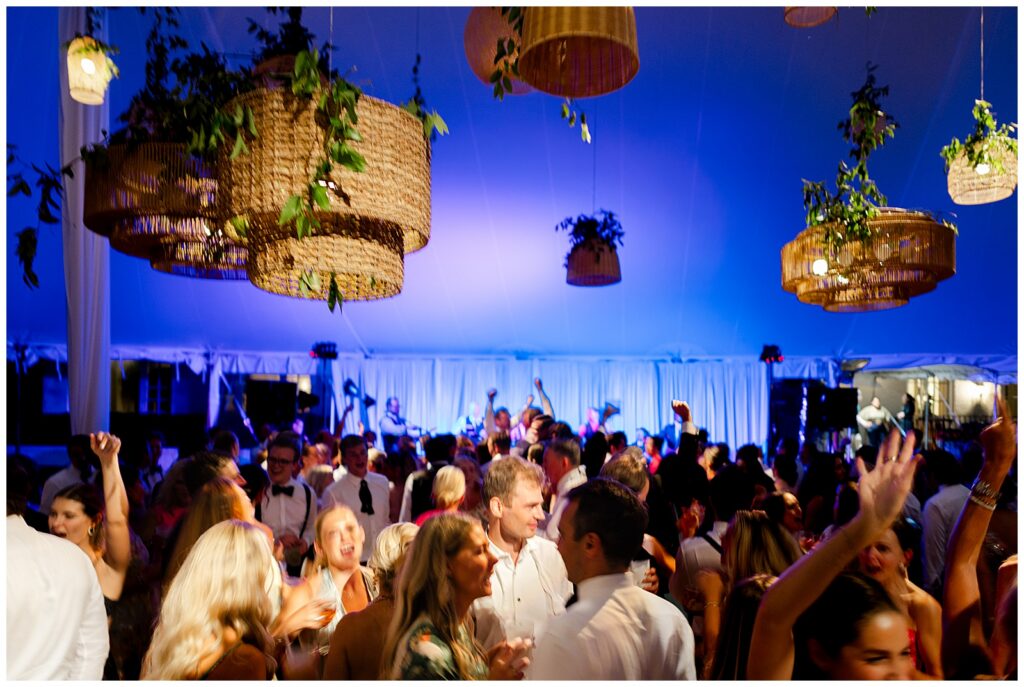 Guests dancing and celebrating with the bride and groom